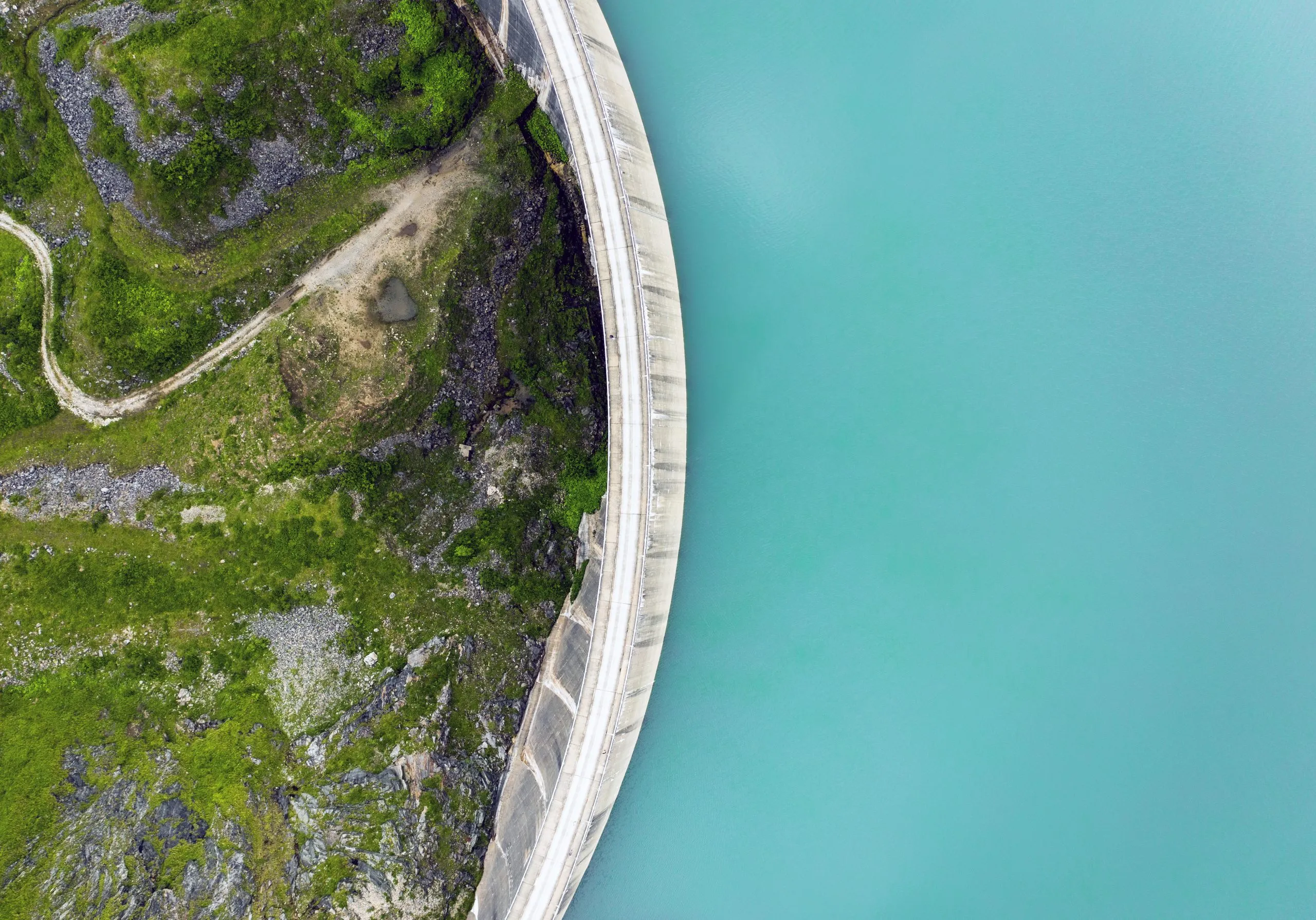 top-view-of-a-lake-by-the-road-captured-during-the-daytime